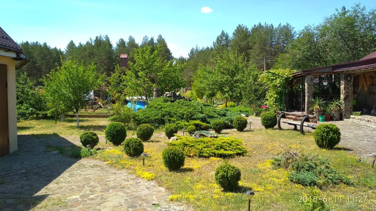 Дома для отпуска Уютная усадьба с озером возле леса Voropaivka-6