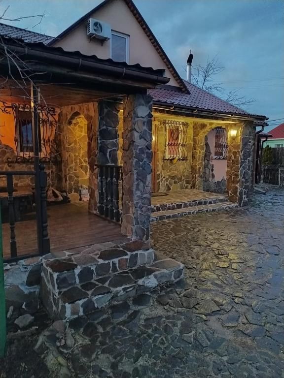 Дома для отпуска Уютная усадьба с озером возле леса Voropaivka-35